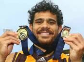 One of the NT's favourite former footy players - Hawks star Cyril Rioli. Picture by Fairfax Media. 