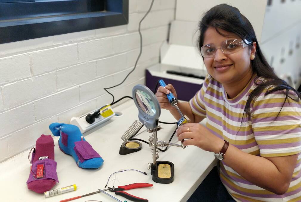 NEW TECHNOLOGY: Smart socks to help those living in remote and rural areas have access to better patient care. Developed by PhD candidate Deepti Aggarwal at The University of Melbourne. Photo: Centre for SocialNUI