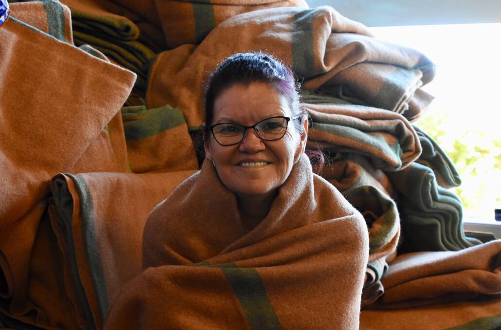 Vinnies centre coordinator, Kay Faulkner, has been run off her feet trying to keep up with demand for warm winter blankets donated by RAAF Base Tindal. 