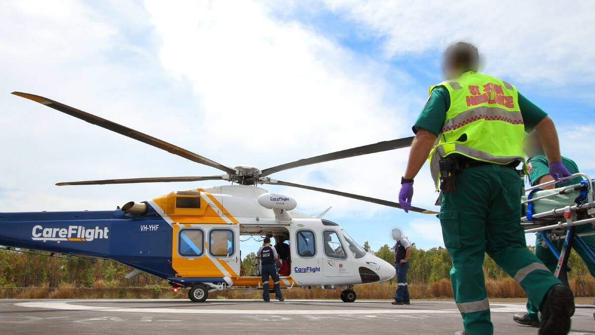 The man is airlifted to Darwin hospital with a suspected snake bite. Picture: Mark Mennie.