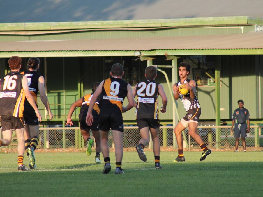 TAKE CHANCES: The Hawks looked to take their chances and kept pace with the highly fancied Nightcliff Tigers in Katherine on Saturday night.
