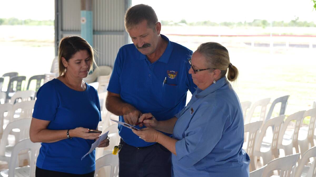 CONFERENCE CONSULTATION: Katherine Town Council Works Administration Officer Cheriece Fry and Acting Director of Works and Services David Moore discuss the schedule for the inaugural Northern Territory Municipal Operations Works Conference and Expo with Roper Gulf Regional Council Director of Council and Community Services Sharon Hillen after inspecting the Katherine Showground venue on April 28. Picture: supplied.