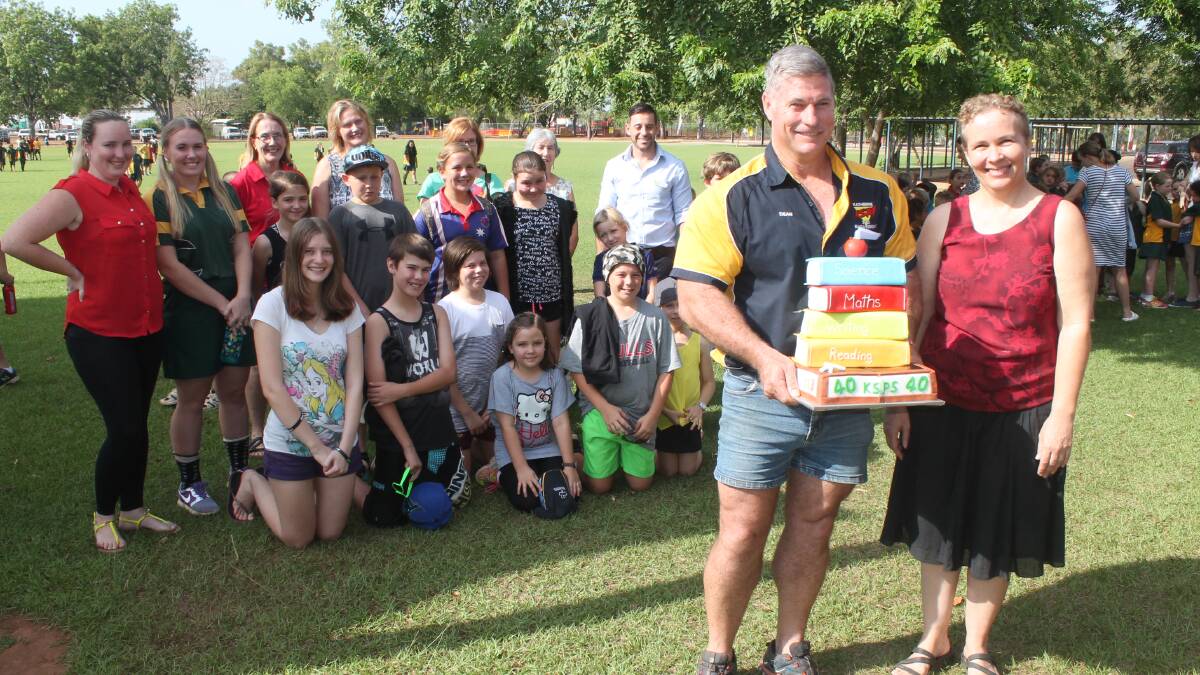HAPPY BIRTHDAY: Former Katherine South Primary students Dean Hersey and Sandra Heinrich cut the cake for the school's 40th anniversary yesterday. Pictures: Chris McLennan