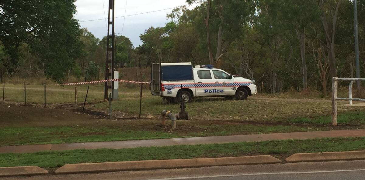 CRIME SCENE: A police vehicle and crime scene tape block the alleged location of an assault on a woman in Katherine last week. 