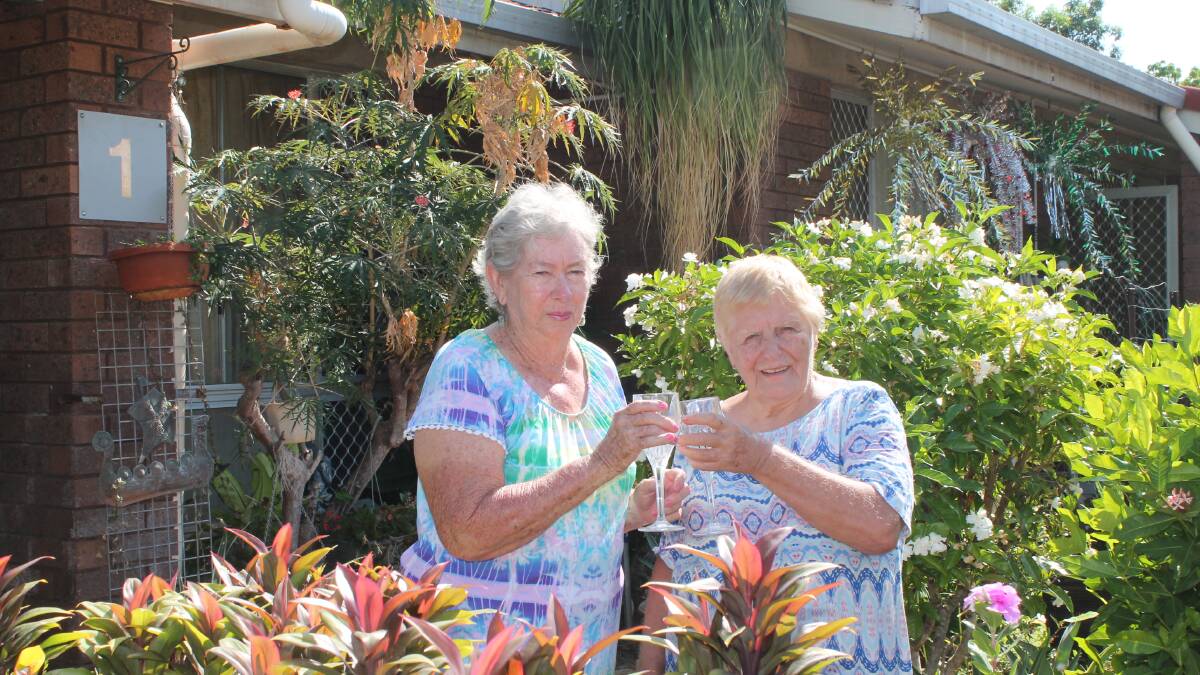 GREEN FINGERS: Jean O'Connor and Robyn Stewart have again won Katherine's public housing garden competition.