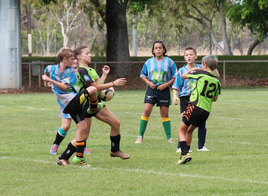 LET'S DANCE: Grand finals were decided in the Katherine Football Club's final games of the year on Saturday morning. Full page of pictures on Page 12.