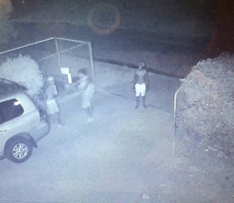 TRESPASSERS: A Katherine security video provided to the Katherine Times shows youths entering a house yard at night.