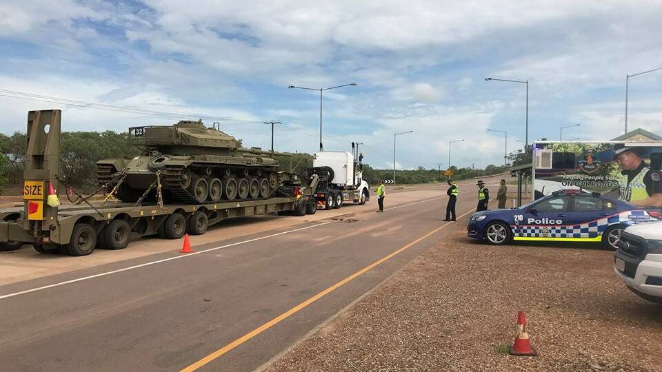 
NO EXCEPTIONS: Darwin Traffic Operations at the Berrimah weigh bridge on Friday – the Centurion tank was an unexpected bonus for the officers – no offences were detected. Picture: NT Police.