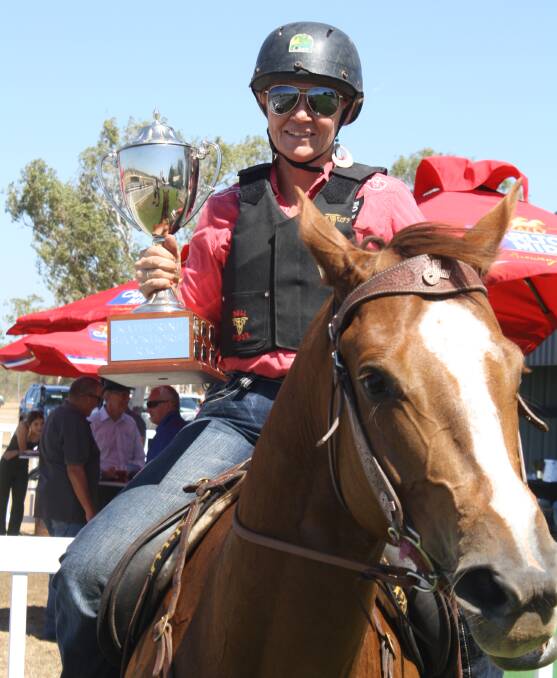 Katherine's own Sarah Hoare beat a determined field to claim the stock horse race cup at yesterday's Katherine races.