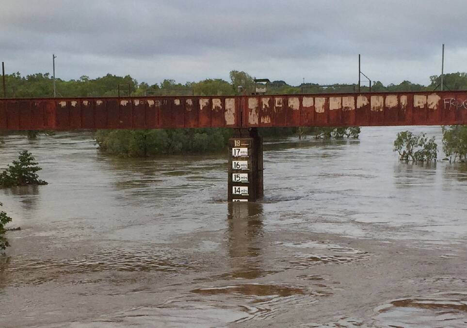 FALLING FAST: The Katherine River on the Railway Bridge this morning.