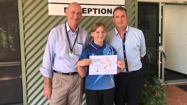 GOOD WORK: Laurie Andrew, Regional Director, Katherine Region, Dawn Batkin, Year 6 student, and Jeff Parker, Principal Clyde Fenton Primary School. Picture: supplied.
