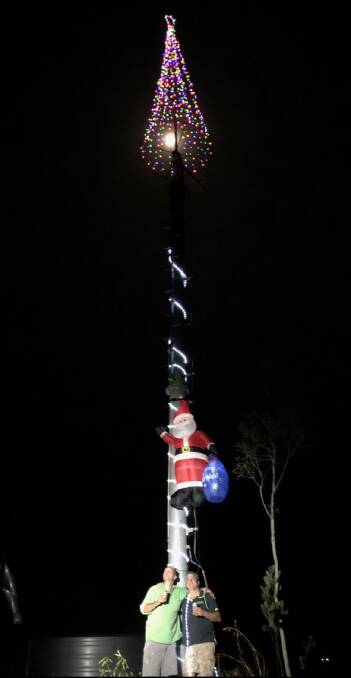 Huge Christmas tree lights up the night sky