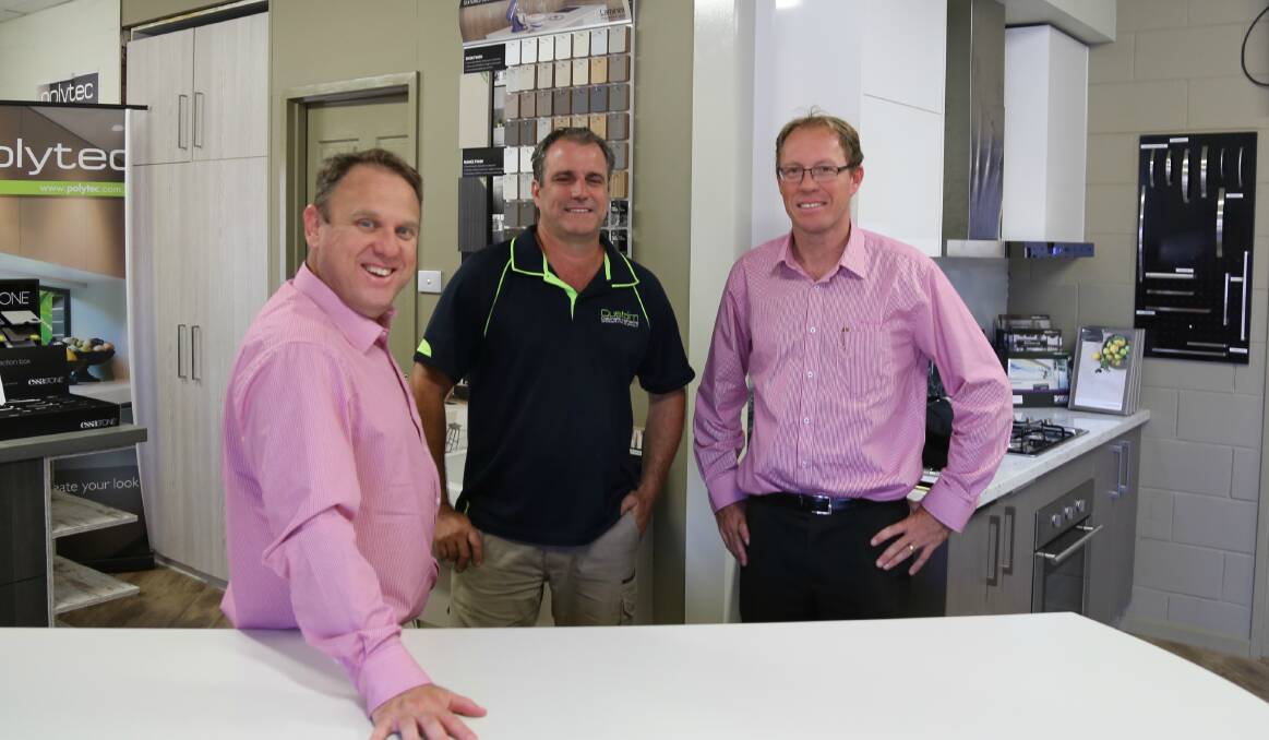 KATHERINE WIN: Dale Connor from Lendlease with Jeff Usher of Custom Cabinets Katherine and NACC Tindal project director Kris Bitz. Picture: supplied.