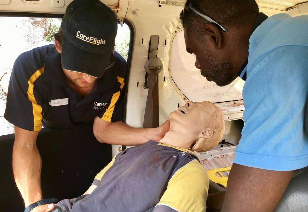 FIRST RESPONSE: East Arnhem Land first responders from different agencies simulate managing patients after a motor vehicle accident. Picture: CareFlight.