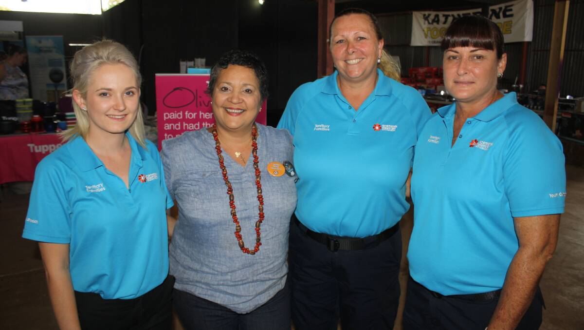 CATCH UP: Katherine MLA Sandra Nelson caught up with three of the five Territory Families' youth outreach team in Katherine at the show - Eden Casey (from left), Louyse Gravenall and Kim Nielson.