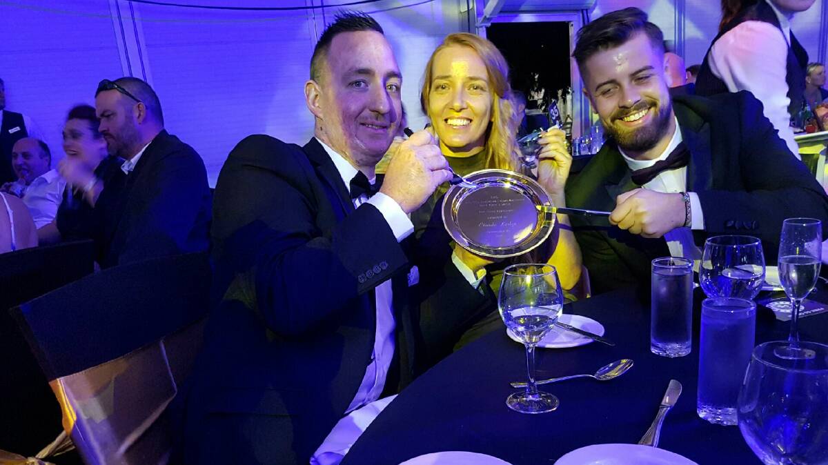 REPEAT WIN: Adam Woods (head chef), Carlie Piert (operations manager) and Charlie Gourlay (guest services manager Cicada Lodge) – with the Gold Plate Award. Picture: supplied.