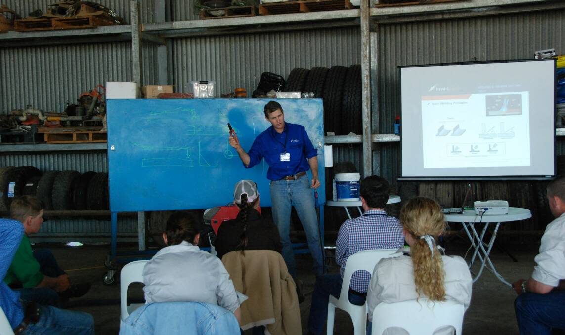 Mick Hewitt talking with staff during Hewitt Cattle Australia's staff training and development event.