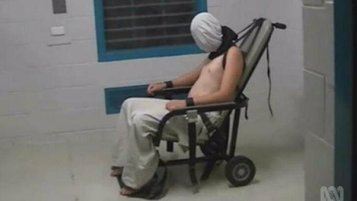 An image from the Four Corners program showing a teenage boy strapped to a mechanical chair in an Alice Springs prison. Photo: ABC Four Corners.