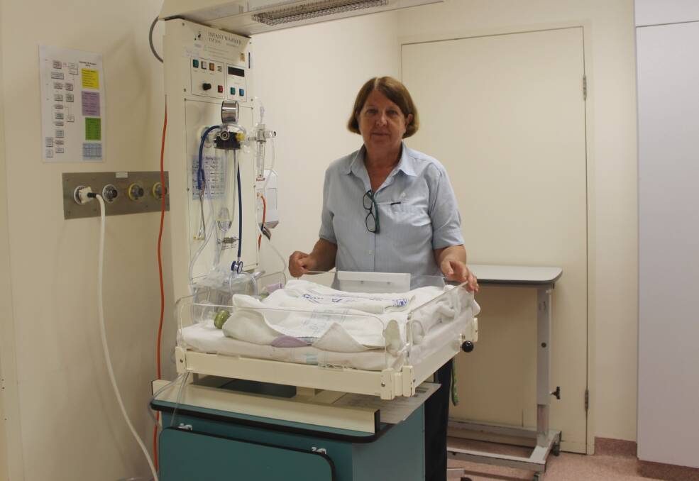 UNSUNG HEROES: After receiving the Administrator’s Medal for Lifetime Achievement in 2014, midwife Elaine McArthur is urging people to nominate for this year's Northern Territory Nursing and Midwifery Excellence Awards.