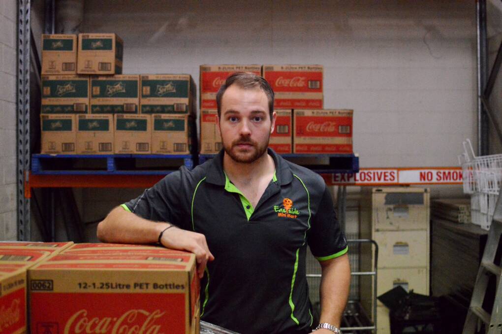 TBL TROUBLES: Eastside Mini Mart manager Shaun Ford says his storeroom shelves are noticeably empty due to a downturn in customers since the introduction of TBLs.