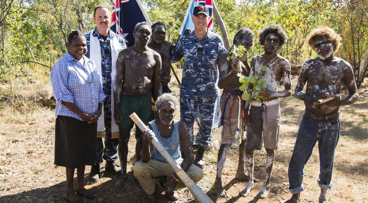 WARM WELCOME: Wing Commander Andrew Tatnell is offered a welcome to country by the Jawoyn traditional owners of the land RAAF Base Tindal is built on last month.