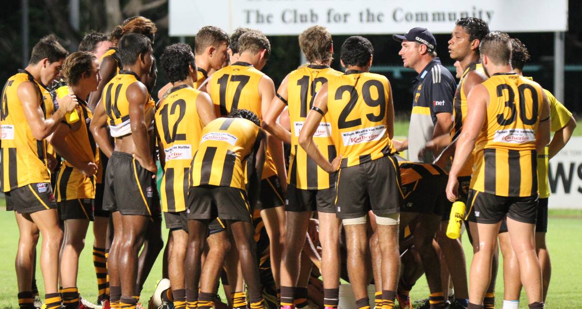 TIO TROUBLES: Big River Hawks coach Greg Bain lays down the law to his players during their battle against the Nightcliff Tigers under lights on Friday. PHOTO: ANNA BLANEY