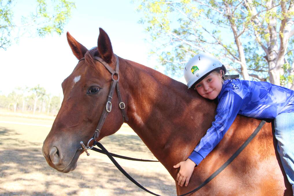 Seven-year-old Georgia Dennis was delighted to win the Katherine Horse and Pony Club's Dolcie Bretherton Trophy on Sunday. Picture: Melody Labinsky