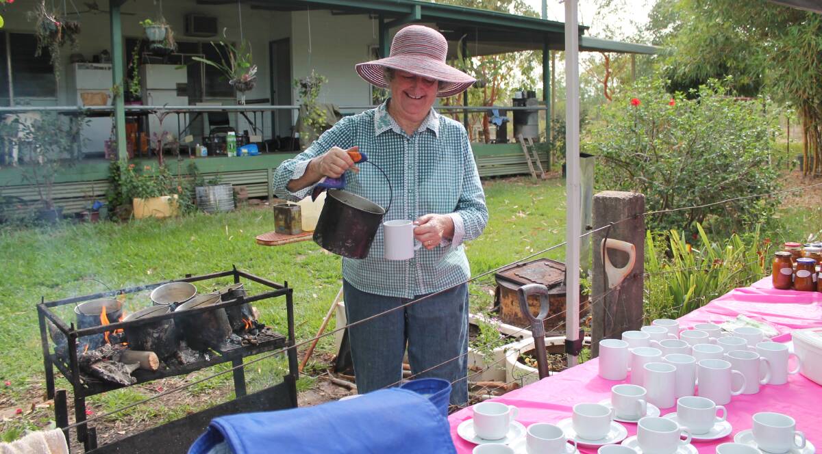 LOVELY DAY OUT: Host Bess Hart keeps everyone's cup of billy tea full as the Katherine community supports Newhaven's sixth Biggest Morning Tea on Saturday morning.