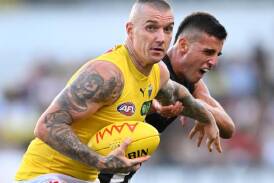 Richmond superstar Dustin Martin has been ruled out of the clash with Sydney with a calf issue. (James Ross/AAP PHOTOS)