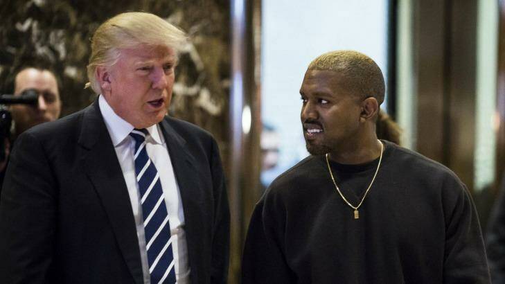 US President Donald Trump and Kanye West in the lobby of Trump Tower, New York, in December. Photo: John Taggart