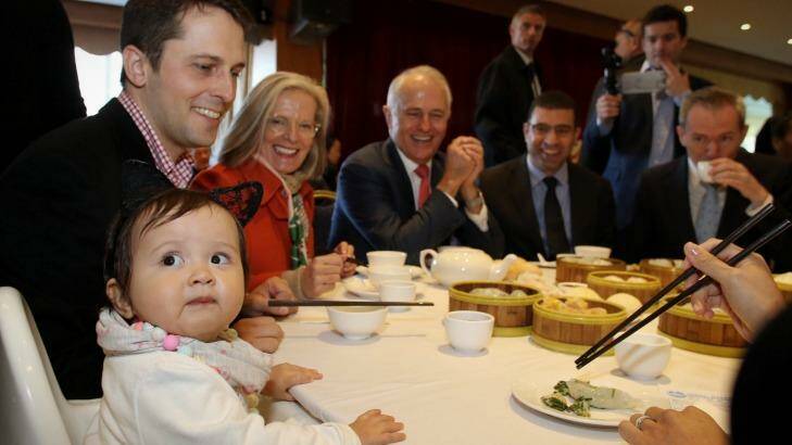 Prime Minister Malcolm Turnbull and Lucy with their granddaughter Isla and son Alex. Photo: Andrew Meares