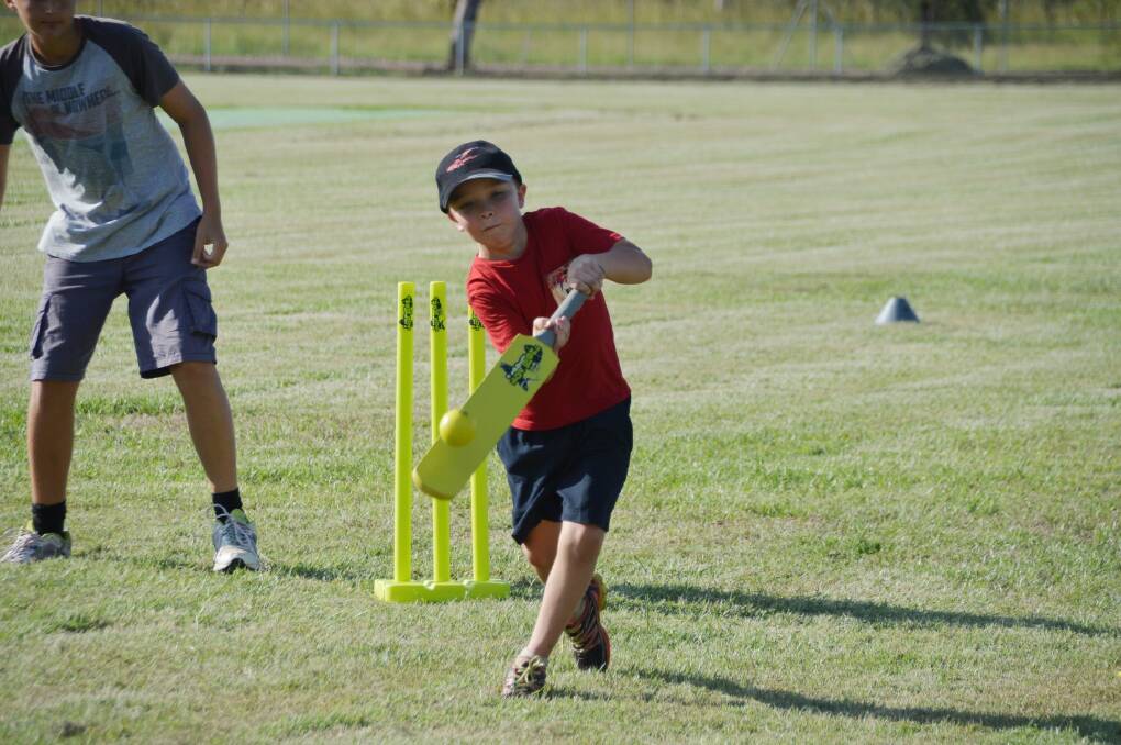 FINE FORM: Patrick Stone goes on the front foot and punishes a loose delivery during NT Cricket’s come and try afternoon in Katherine on April 1.