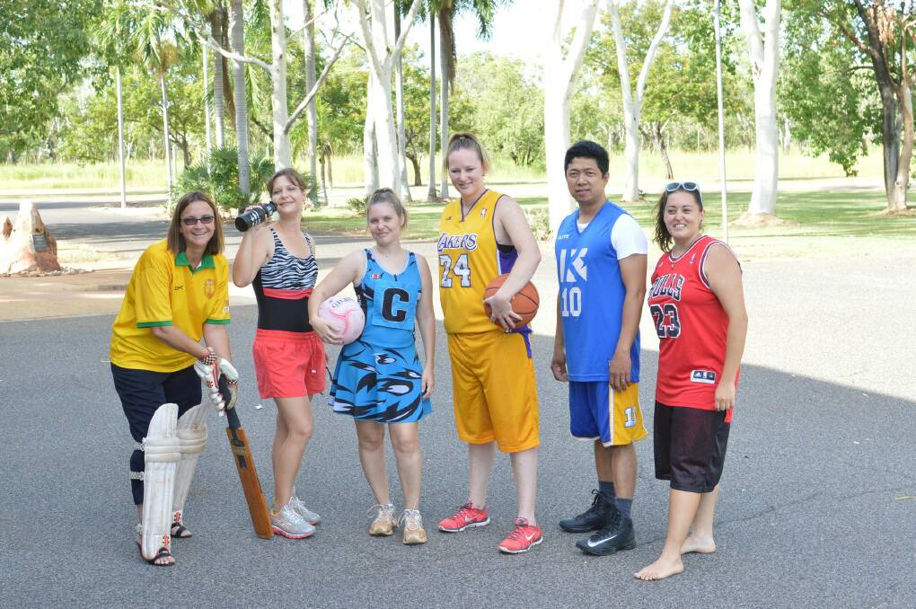 EXPO EXERCISE: Katherine Town Council staff get athletic and swap their everyday attire for sporting equipment ahead of Saturday’s Come and Try Sports Expo at the town’s sportsgrounds.