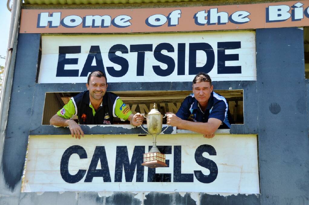 Katherine Camels coach Craig Blair and his Eastside Football Club opposite number, Greg Bain, square off with the Nitmiluk Tours Premiership Cup ahead of tonight's grand final. Up to 1500 people are expected to converge on Nitmiluk Oval to watch the clash. 