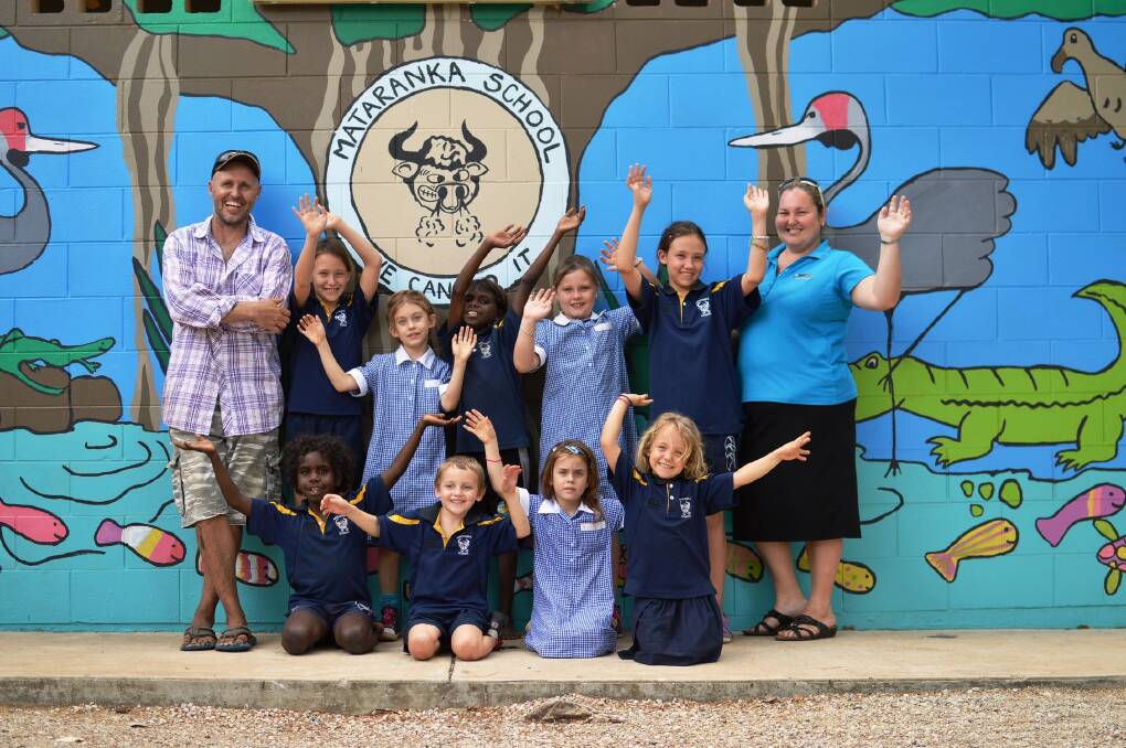 SUPPORT ROUND-UP: Mataranka Primary School students throw their hands up in support of the school council’s push to make the 2015 Never Never Festival and rodeo, which will be held in May, bigger and better than ever.