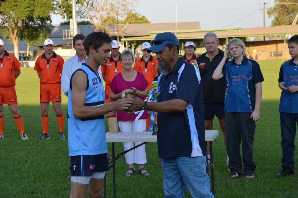 Eastside kicking sensation William Kossack is presented with his trophy for booting the most goals in 2014.