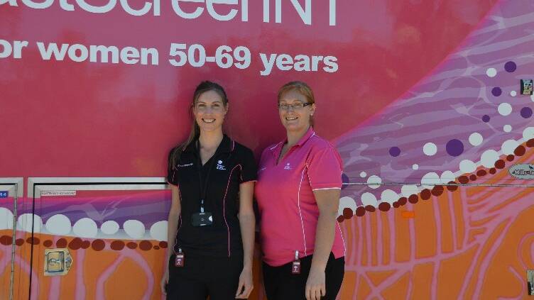 BreastScreenNT radiographers Louise Croft and Sarah Webb with the eye-catching truck.
