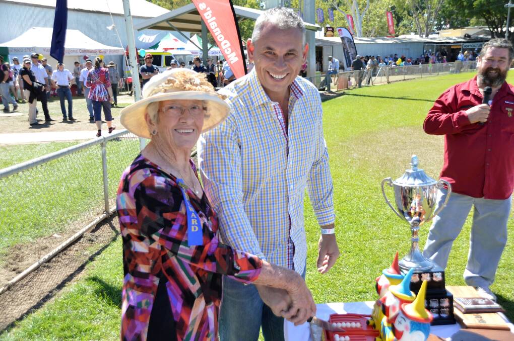 TAKING THE CAKE: Katherine Show stalwart Fay Cox and Chief Minister Adam Giles cut the special 50th anniversary cake on Friday afternoon.