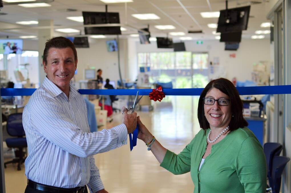 OPEN FOR BUSINESS: Member for Katherine Willem Westra van Holthe and Fresenius Medical Care managing director Margot Hurwitz cut the ribbon on the town’s new $2.9 million renal unit on Casuarina Drive on Monday morning.