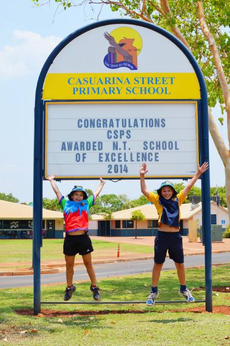 CASUARINA CELEBRATIONS: School captains Silvana Goldbach-Eggert and Joshua Halverson jump for joy after Casuarina Street Primary School was crowned
the best in the Northern Territory on October 31.
