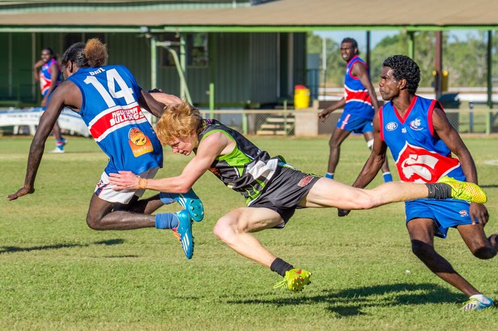 CAMEL CLASS: Isaac Bell brings Maverick Thompson to a stunning halt during the Katherine Camels' clash against the Ngukurr Bulldogs at Nitmiluk Oval at the weekend. Photos: CASEY BISHOP