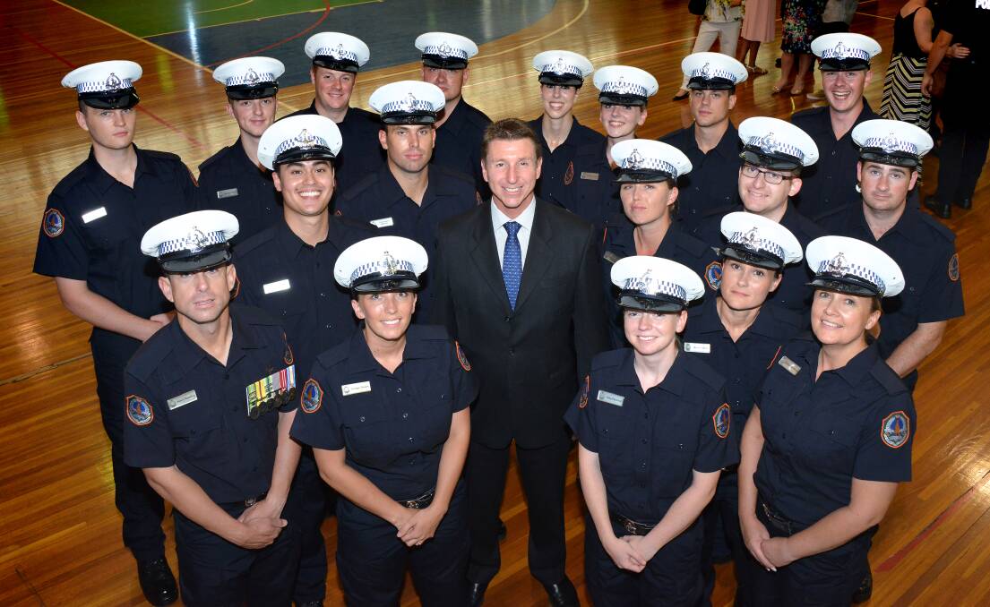 NEW KATHERINE COPS: Deputy Chief Minister Willem Westra van Holthe congratulates the 18 new police recruits set to call the town home.