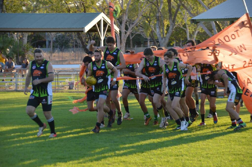 The Camels run onto Nitmiluk Oval for the clash.