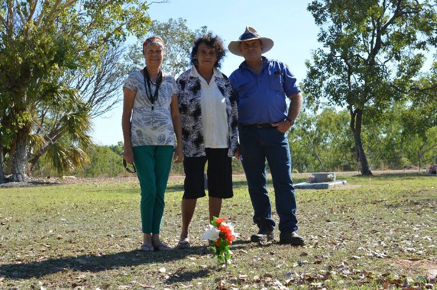 RECOGNITION NEEDED: Ellen Gough, Juanita Heparia and Neil Camm at the grave they hope to get a headstone for.