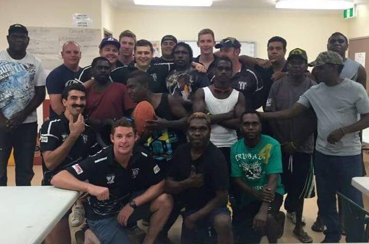 BUILDING THE BONDS: Tindal Magpies players catch up with some of the team’s newest members at the Venndale rehabilitation centre last week.
