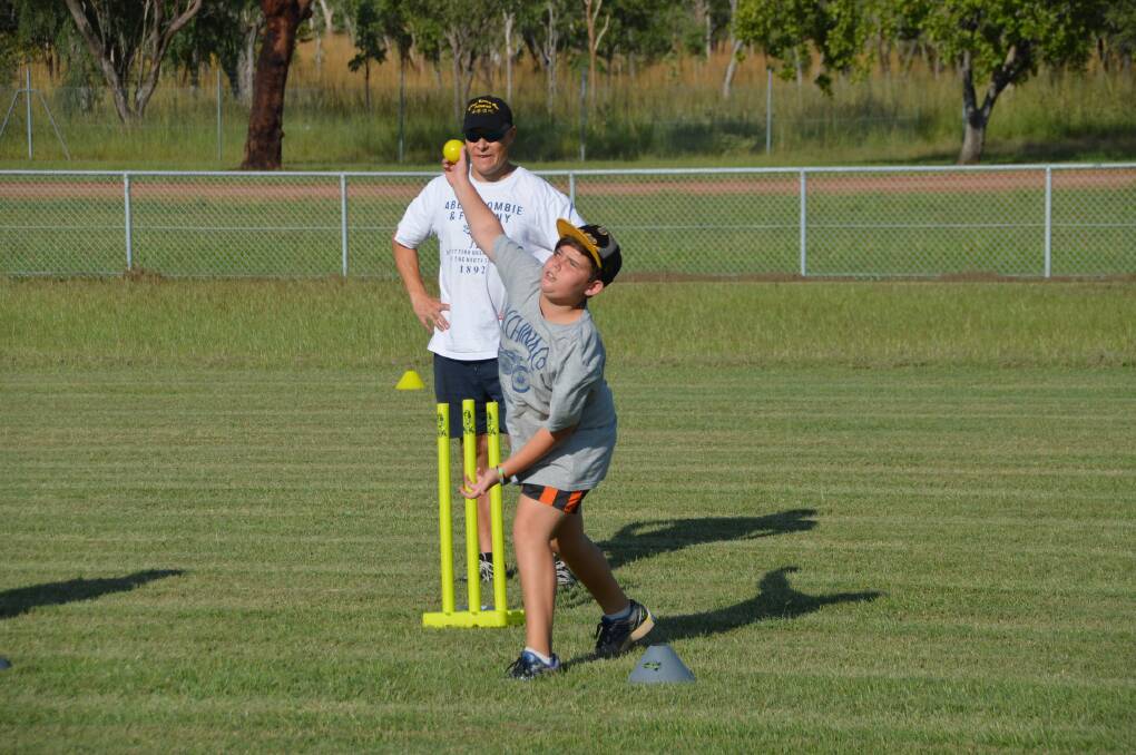 Harry Talbot rolls his arm over ahead of the 2015 Katherine and District Cricket Association season.