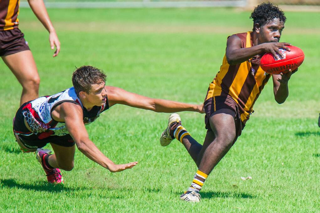 HOT HAWKS: Ray Fordemail in action during the Big River Hawks' 77-point win against the Southern Districts Crocs at the weekend. Photos: CASEY BISHOP