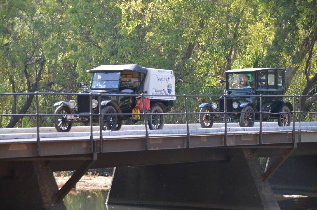 Lindsay Bell and Merv Kroll check out the Low Level Bridge in their Model T Fords. 