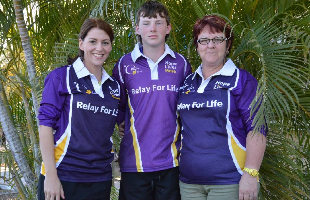 GOING PURPLE: Lauren Reed, Kyle Quill and Jenny Mackie discuss tactics ahead of the Katherine Relay for Life on September 6.