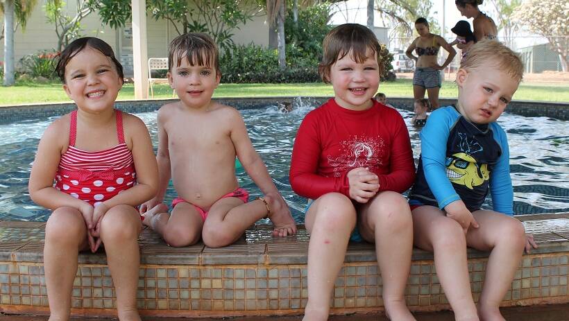 SWIM SAFETY: Leilani Machin, Ned Machin, Ruby Prime and Sam Prime are all smiles as they get a few swimming lessons on Monday afternoon.